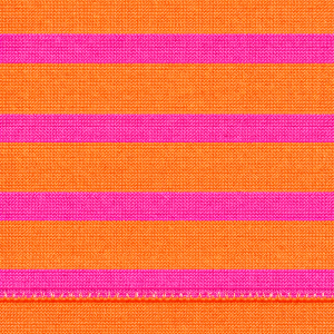 SAINT JAMES Galathee: Orangefarbener Stoff mit hellrosa Streifen und einer sichtbaren Naht am unteren Ende.
